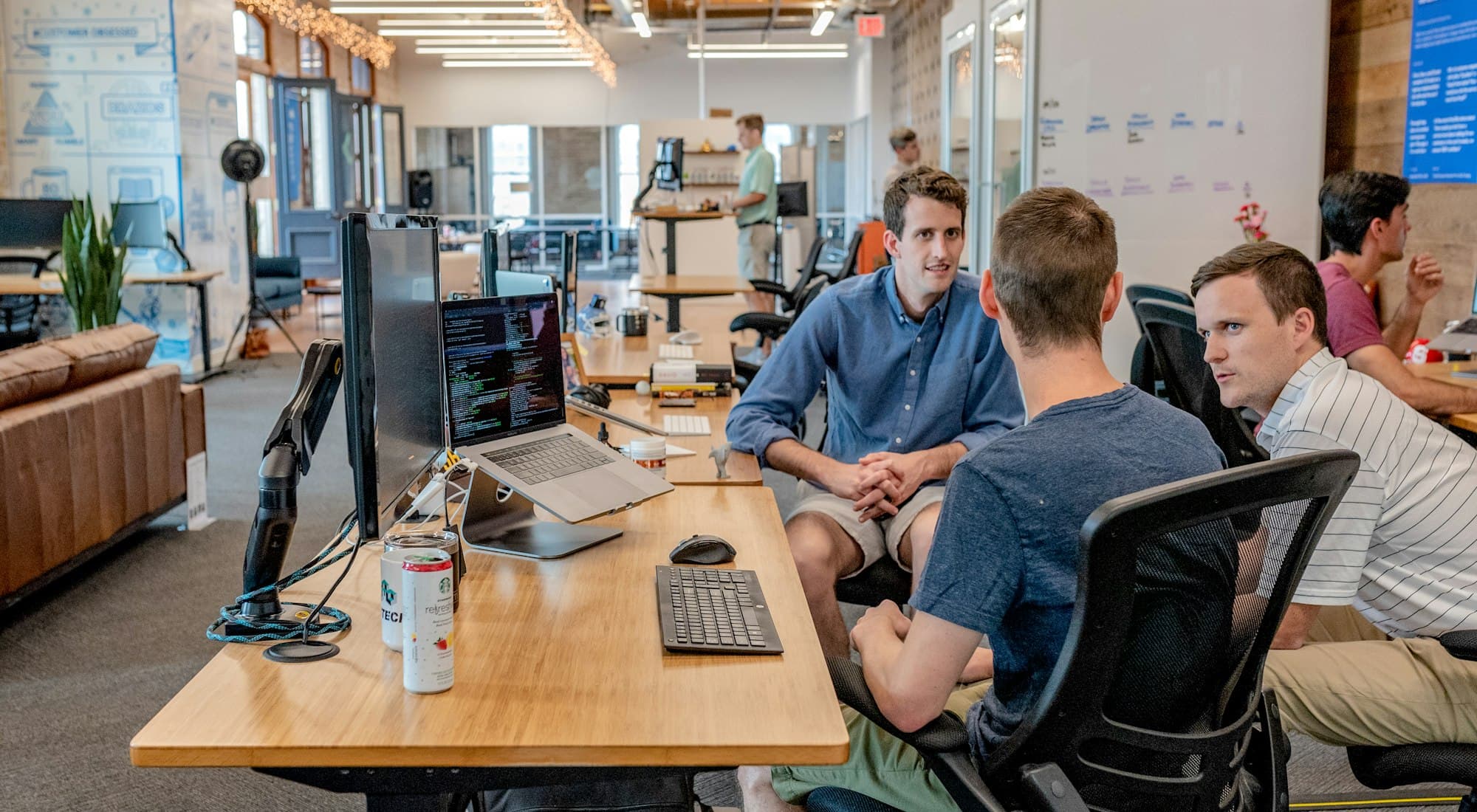 A consultancy team working together in an office